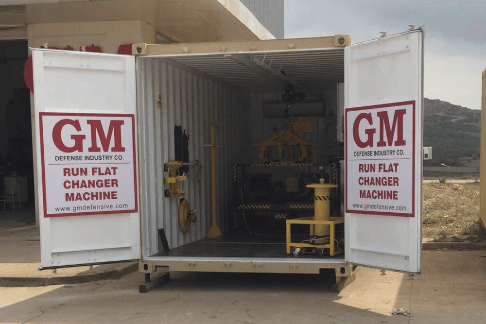 GMH-098 Container Model — interior view showing the run-flat changer machine installed and operational inside the 20-foot ISO container